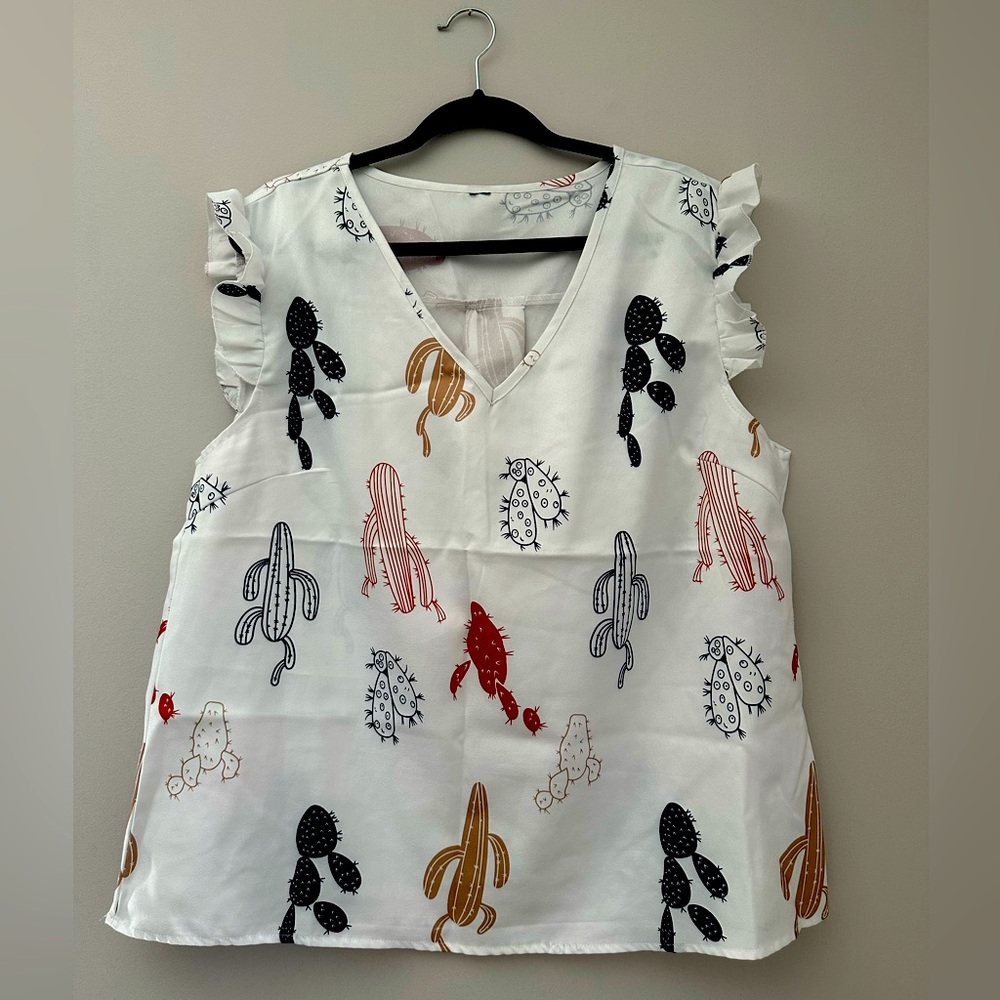 Cap sleeve cactus print blouse.